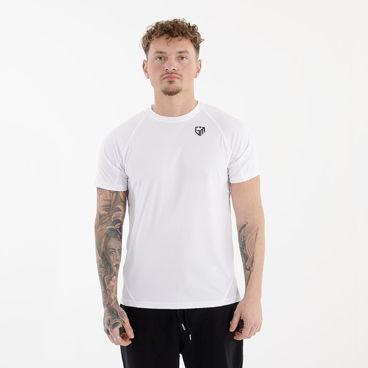 Front view of a man wearing an active panel tee in white