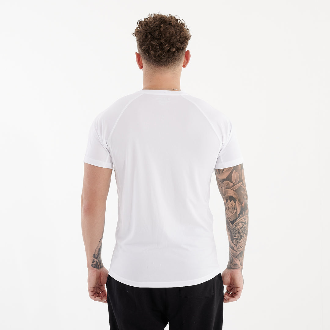Back view of a man wearing an active panel tee in white