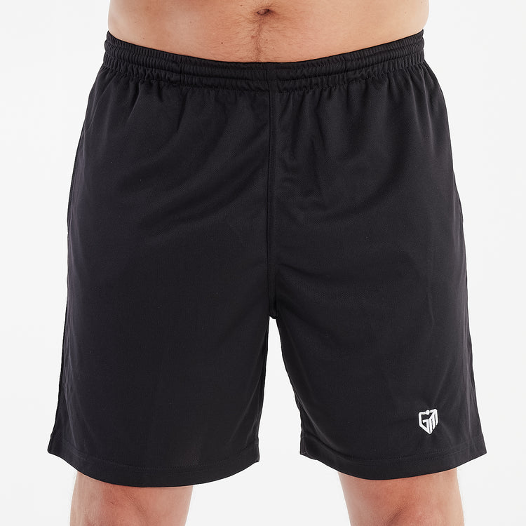 Front view of a man wearing jet black cool workout shorts