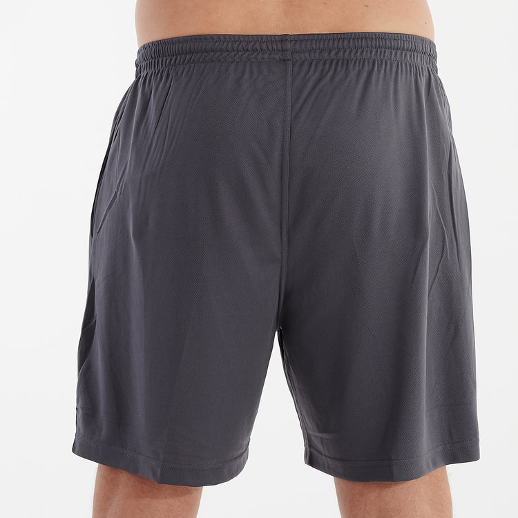 Back view of a man wearing charcoal cool workout shorts