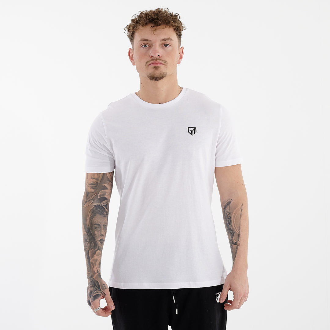 Front view of a man wearing a white organic everyday t-shirt