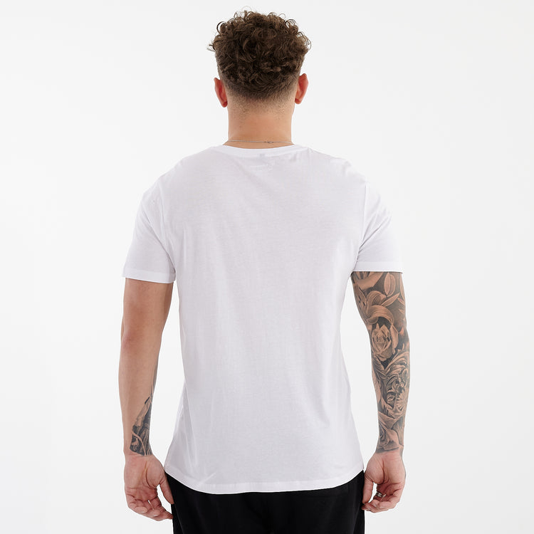 Back view of a man wearing a white organic everyday t-shirt