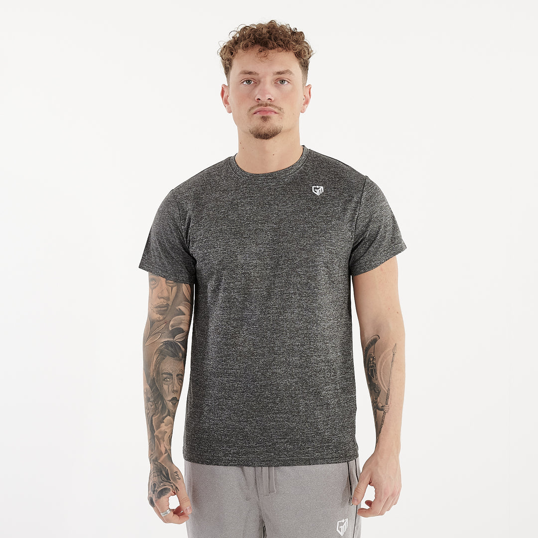 Front view of a man wearing a asphalt performance recycled tee