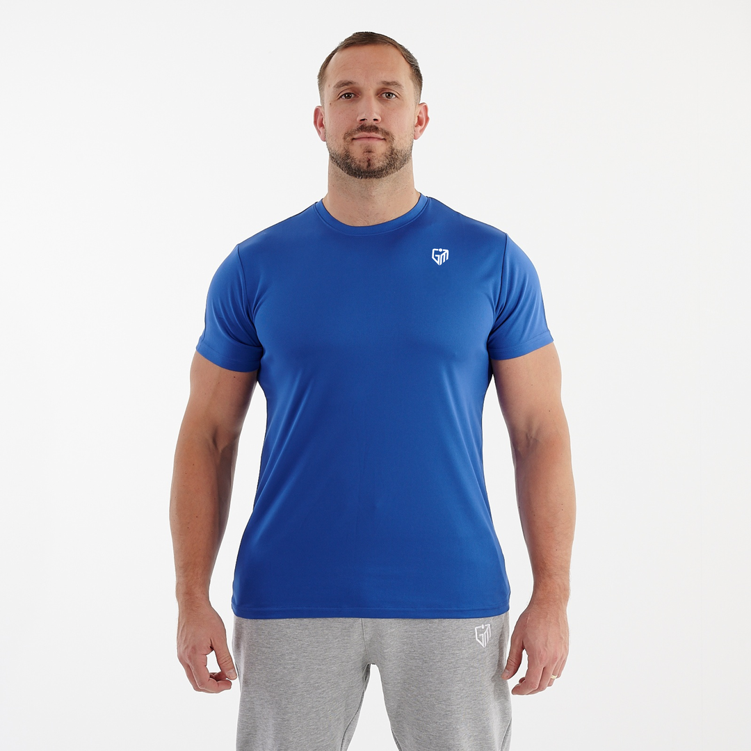 Front view of a man wearing a blue performance recycled tee.