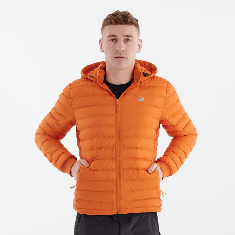 Front view of a man wearing a recycled lightweight jacket in flame orange