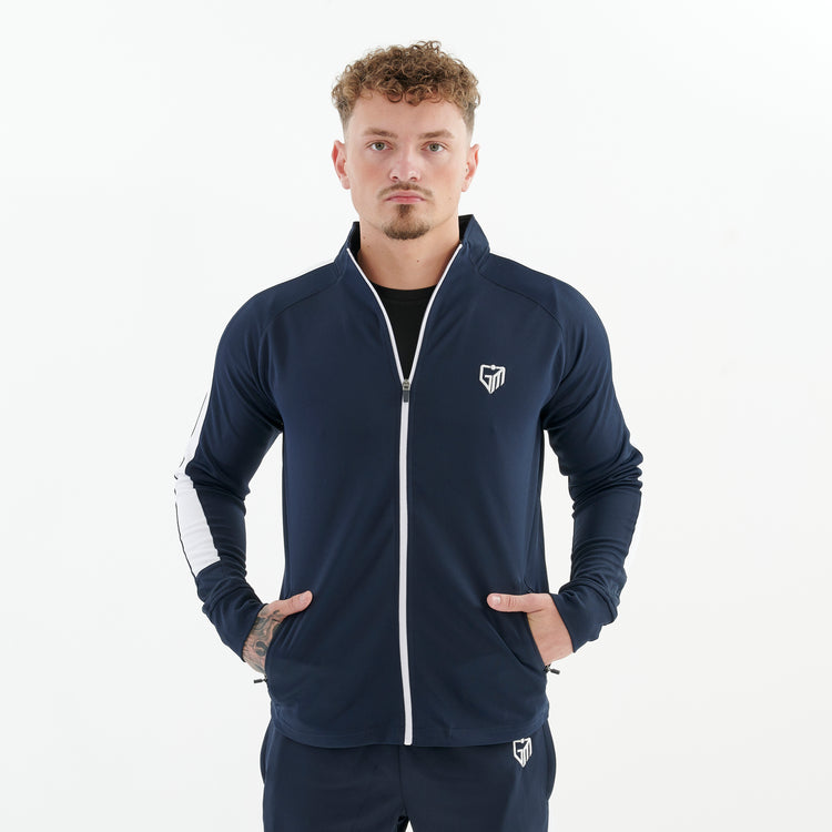 Front view of a man wearing a slim fit knitted tracksuit top in navy/white