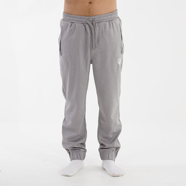 Front view of a man wearing grey sustainable knit joggers