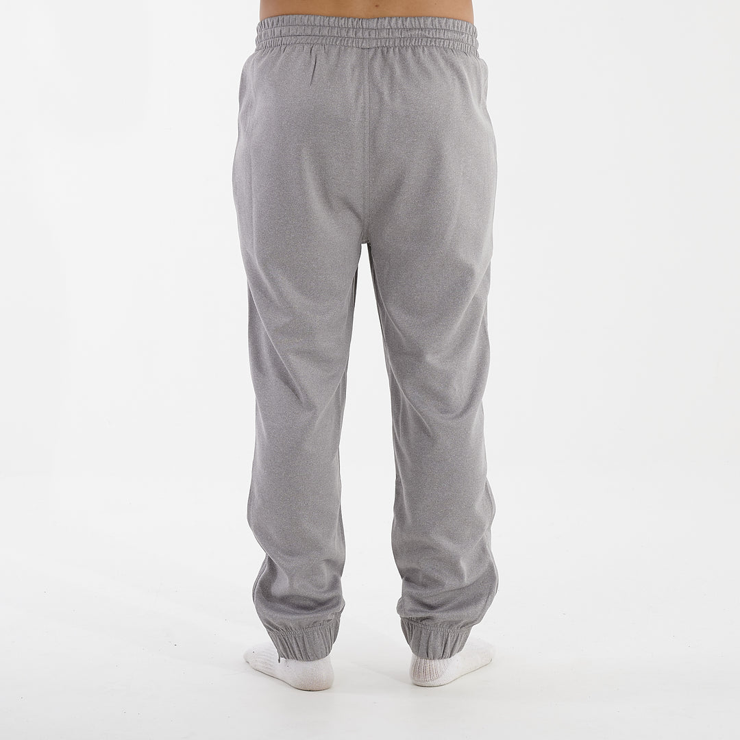 Back view of a man wearing grey sustainable knit joggers
