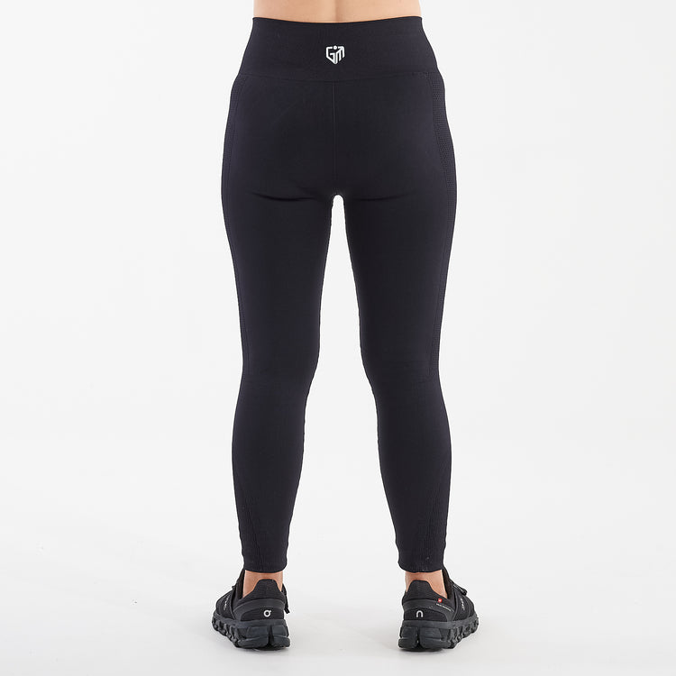Back view of a woman wearing black sculpt fit multi sport leggings