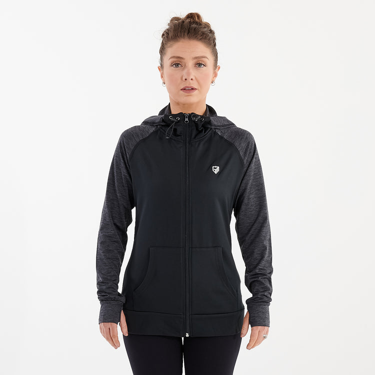 Front view of a woman wearing a black performance contrast hoodie