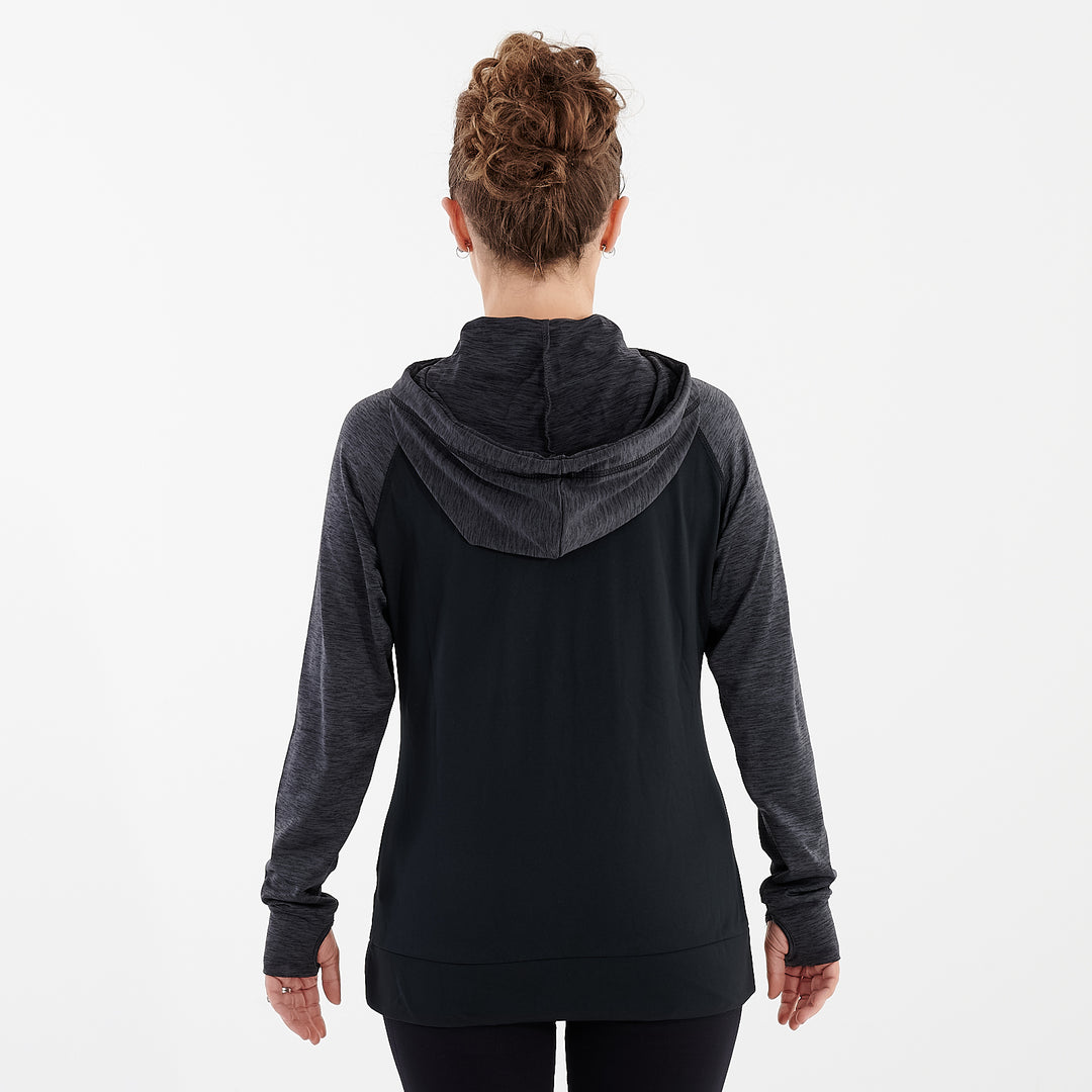 Back view of a woman wearing a black performance contrast hoodie