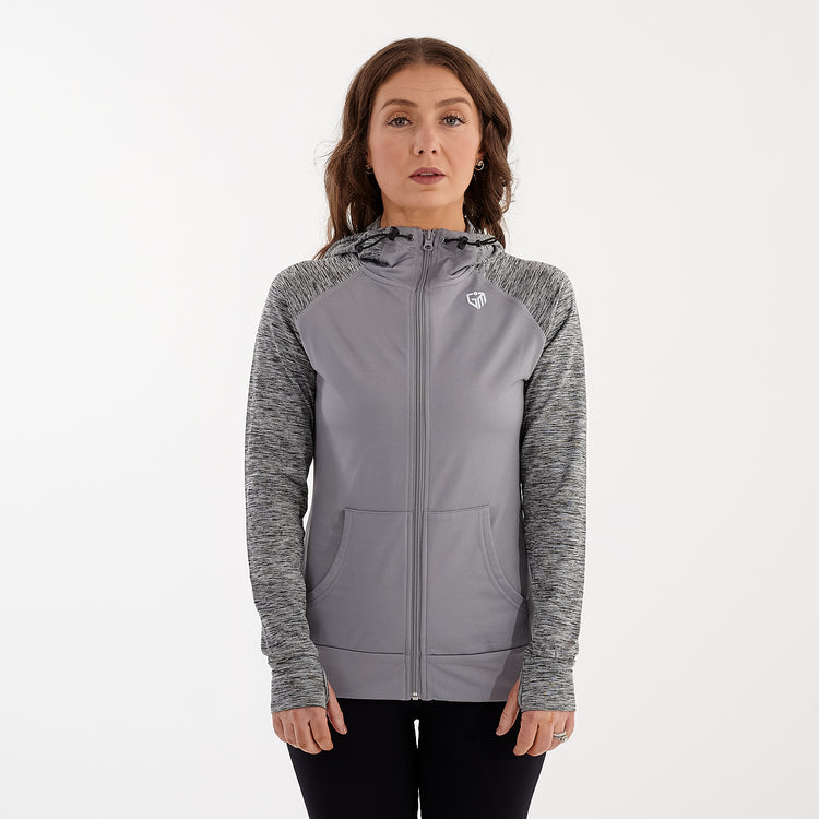 Front view of a woman wearing a performance contrast hoodie