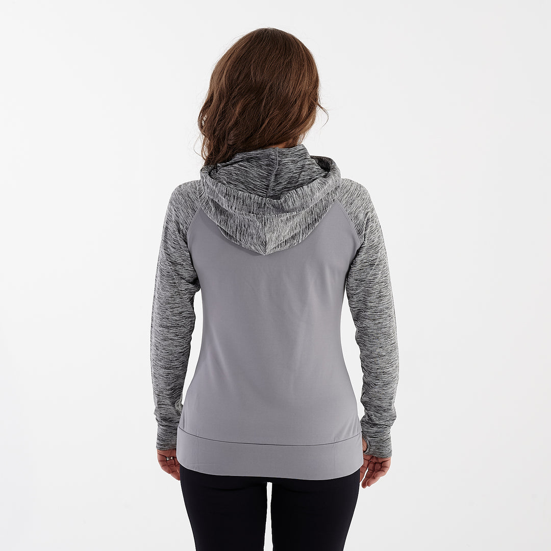 Back view of a woman wearing a performance contrast hoodie
