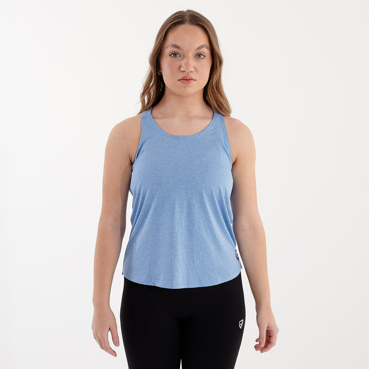 Front view of a woman wearing a sky blue strappy back performance vest