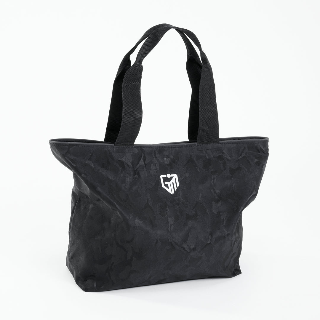 Front view of a black camo everyday tote bag