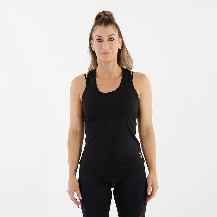 Front view of a woman wearing an active racerback vest in black