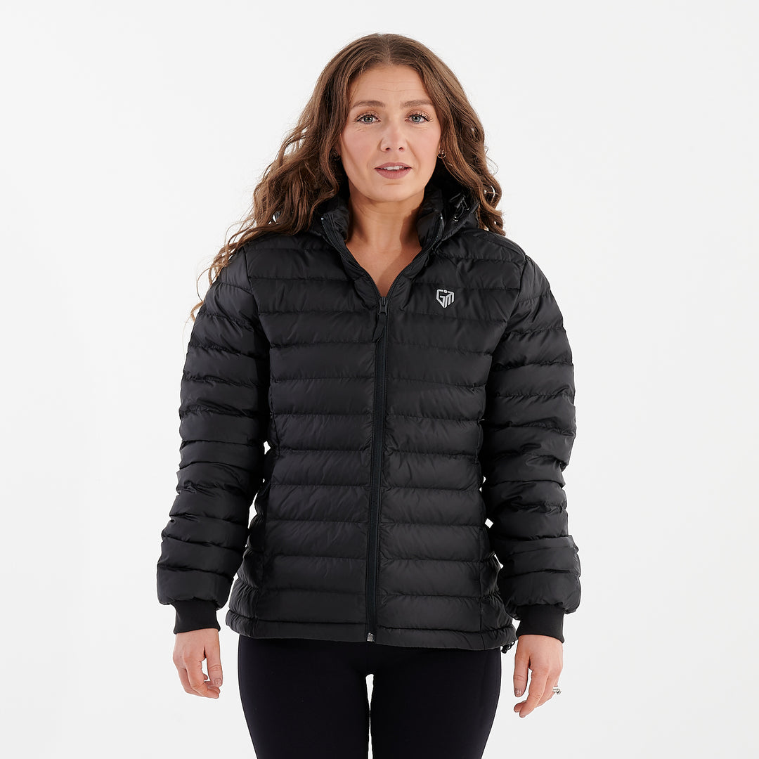 Front view of a woman wearing a black recycled lightweight jacket