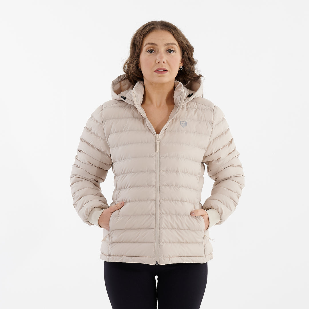 Front view of a woman wearing a desert dust recycled lightweight jacket