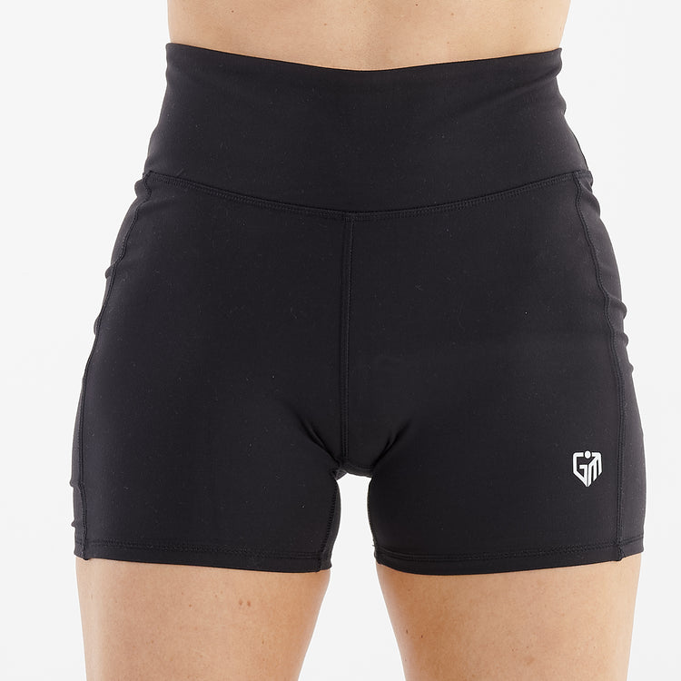 Front view of a woman wearing recycled micro shorts